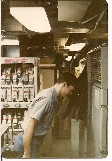 Me as a data systems technician in the computer room of my ship in heavy seas in the north atlantic